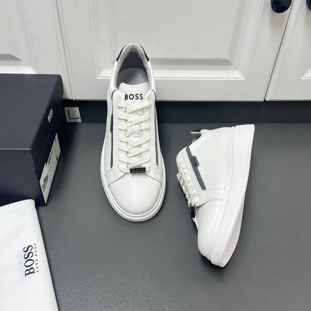 商品商标:HUGO BOSS 运动鞋 正码码数:38-44 商品材料:2024秋冬皮革运动男鞋,这款采用光滑小牛皮鞋面,撞色牛皮革包裹并饰以logo压纹字母,两