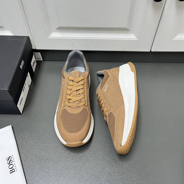 商品商标:HUGO BOSS 运动鞋 正码码数:38-44 商品材料:当季最新款四色可选,这款鞋面采用进口牛巴戈与透气网布拼接，侧身穿孔细节 ，耐磨止滑橡胶厚大