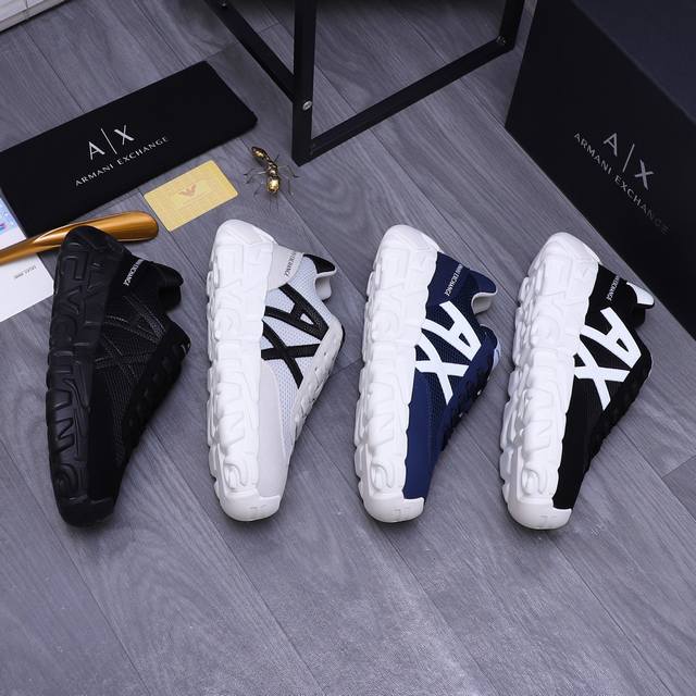 商品商标：Armani 阿玛尼 休闲鞋 正码码数: 39－45 商品材料：精选牛皮拼接鞋面 网布加超纤绒 运动海棉里 发泡组合大底！