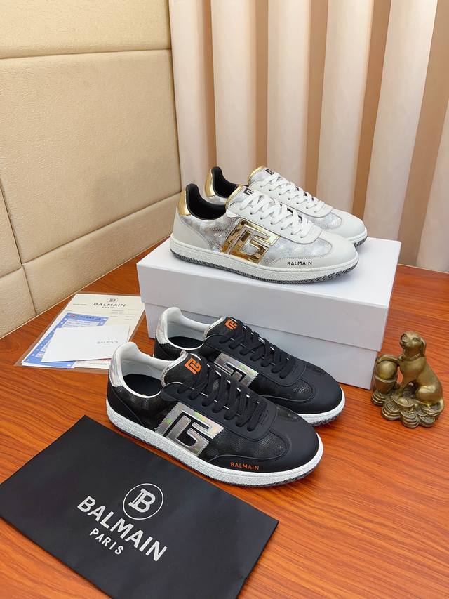 实价： BALMAIN巴尔曼B-Skate运动鞋 B-Skate 多材质拼接撞色运动鞋 ，鞋面饰有黑色鞋带，皮革拼接鞋舌点缀 Balmain 徽标， TPU 鞋