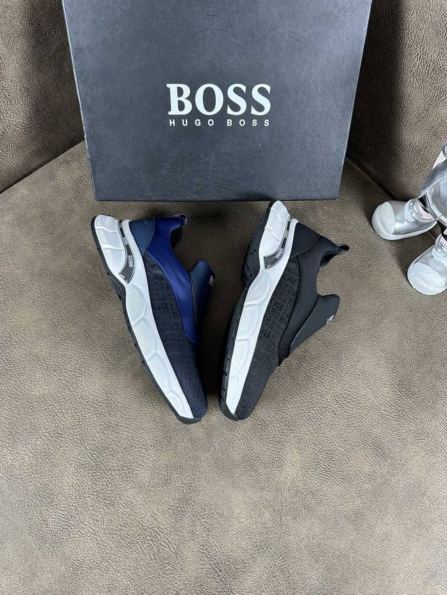 工厂价： Boss 运动男鞋，以经典的设计成为永不落幕的时尚宠儿，经典的休闲造型。采用进口透气面，太阳]品牌专用大底，Tpu耐磨超轻大底，轻便，整体设计和谐统一