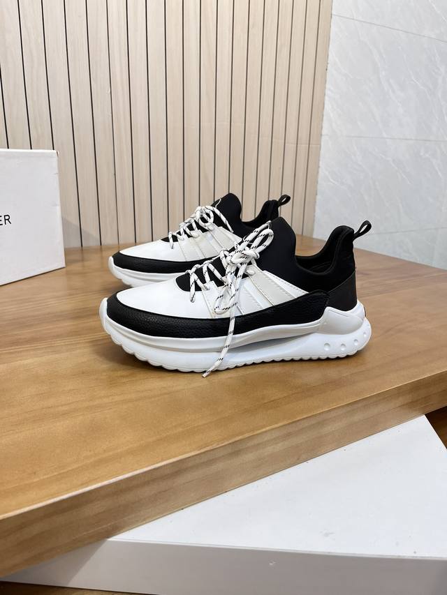 价:商品商标：Moncler 蒙口 低帮运动鞋正码码数: 39-44 可订做38.45商品材料：鞋面进口透气飞织 专业滴胶工艺，透气内里，超轻发泡大底编 号：8