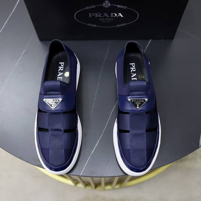 品牌：Prada 普拉达标准码：男码38 44 45可以定做等级：官网同款材料：原版牛皮拼接编织带 透气舒适内里 原版发泡耐磨柔软大底款式类别：休闲运动版 年轻